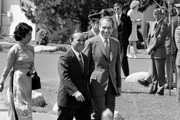President Richard Nixon and South Vietnamese President Nguyen Van Thieu wear big smiles as Nixon welcomes Thieu to the Western White House in San Clemente, Calif., April 2, 1973. At left is the South Vietnamese president's wife, Nguy?n Th? Mai Anh. The two leaders will hold two days of meetings. (AP Photo)