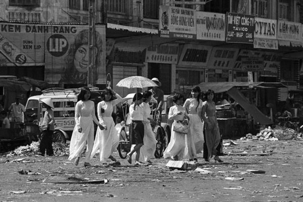 17 Feb 1968, Saigon, South Vietnam --- This relative calm in Saigon was shattered when Communist forces launched coordinated mortar and rocket attacks against U.S. and South Vietnamese positions in Saigon and elsewhere in a wide area of South Vietnam.  The ladies are pictured in the market area on a sunny February 14th in Saigon. --- Image by © Bettmann/CORBIS