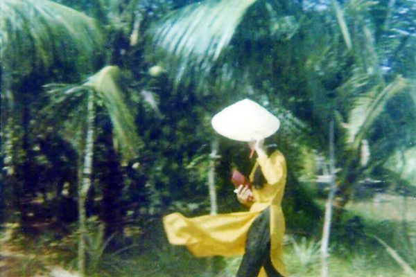 saigon-1970---a-girl-is-walking-into-town-from-outside-of-saigon_6165058892_o