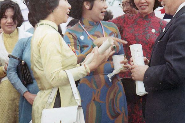 Madame Thieu

Of course she is the center of attention, a beatyful and charming lady. I'm not sure who she is talk to here, for some reason I think the minister of health.

https://www.flickr.com/photos/vidanusa/7465109402/in/album-72157630338757300/