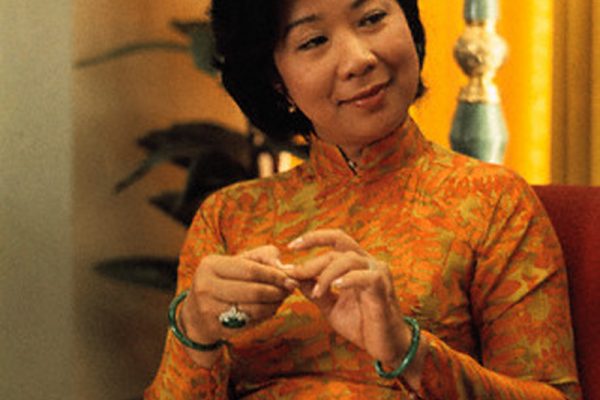 11 Mar 1970, Saigon, South Vietnam --- Vietnam's first lady, Mme. Nguyen Van Thieu, fidgets with a notebook as she discusses the contrast between herself and the one time first lady of Vietnam, Mme, Ngo Dinh Nhu.  Mme. Thieu says she does not advise her husband on affairs of state.  "His interest in politics and mine is social welfare, I can help him most this way," she says. --- Image by © Bettmann/CORBIS