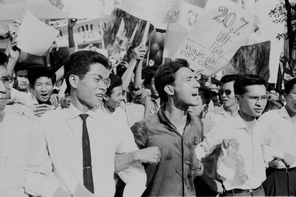 Anti-Communist Students demonstrating in Saigon (Ho Chi Minh City) on the 10th anniversary of the 1954 Geneva accords, South Vietnam, July 1964. (Photo by Nguyen Van Duc/Michael Ochs Archives/Getty Images)