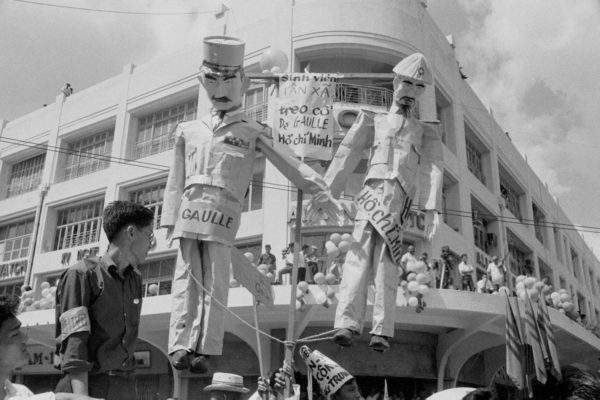 Anti-Communist Students demonstrating in Saigon (Ho Chi Minh City) on the 10th anniversary of the 1954 Geneva accords, South Vietnam, July 1964. Effigies of French President Charles de Gaulle and Vietnamese leader Ho Chi Minh are depicted being hung hand in hand. (Photo by Nguyen Van Duc/Michael Ochs Archives/Getty Images)