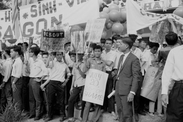 Anti-Communist Students demonstrating in Saigon (Ho Chi Minh City) on the 10th anniversary of the 1954 Geneva accords, South Vietnam, July 1964. (Photo by Nguyen Van Duc/Michael Ochs Archives/Getty Images)