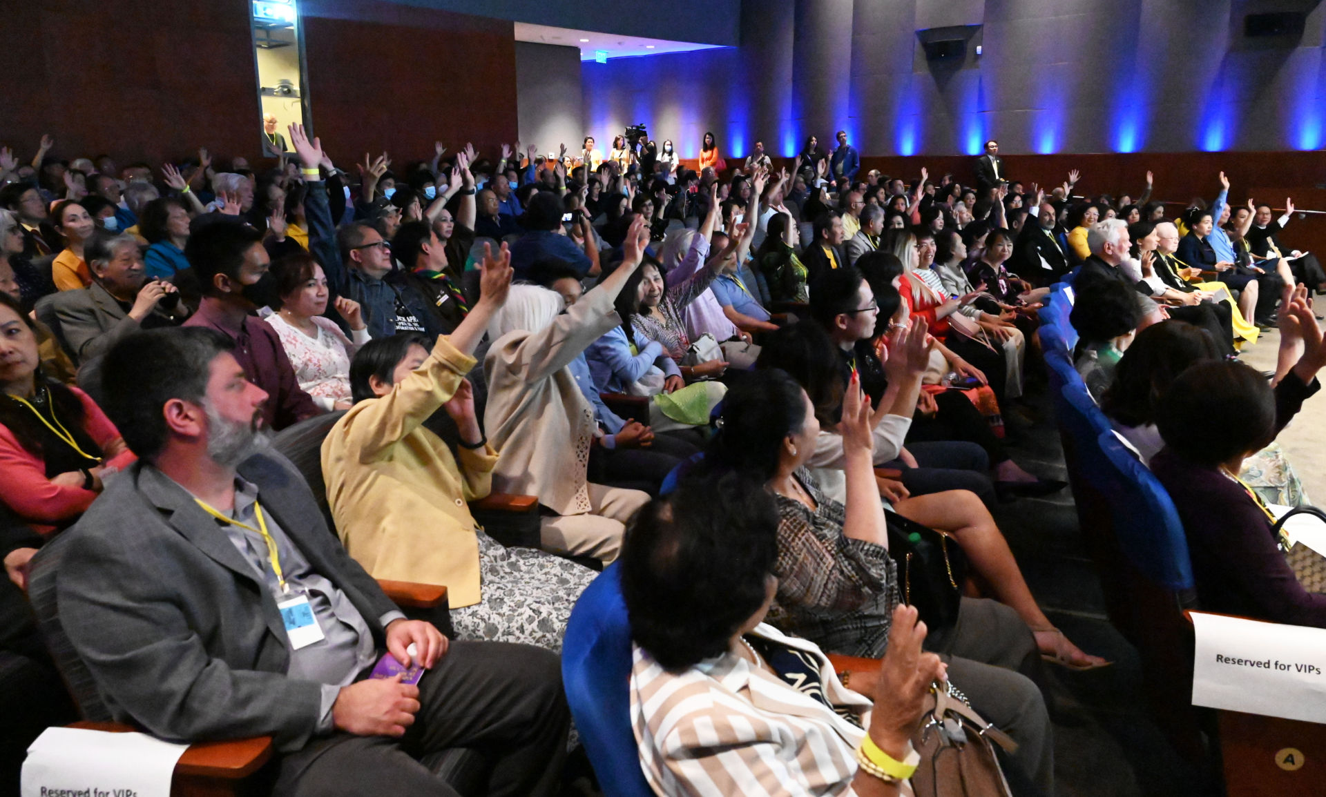 Panel discussion at a museum auditorium